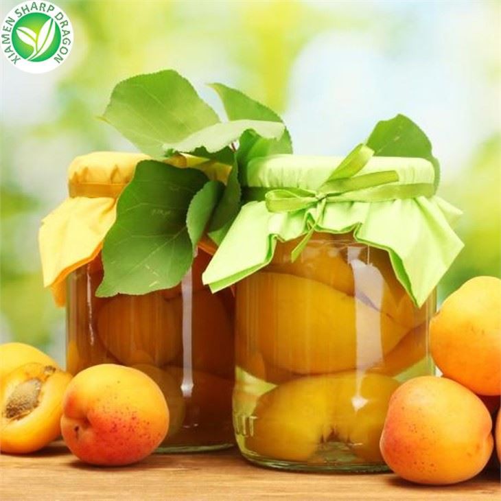 Niðursoðnar sætar gular ferskjur